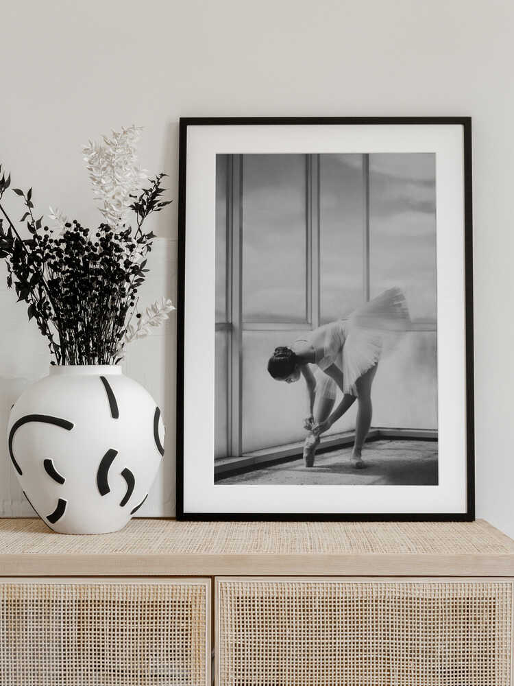 Ballerina Tying Pointe Shoes