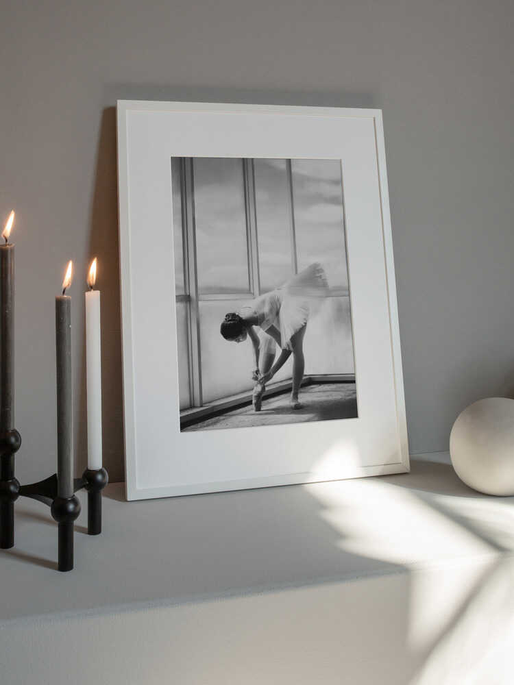 Ballerina Tying Pointe Shoes