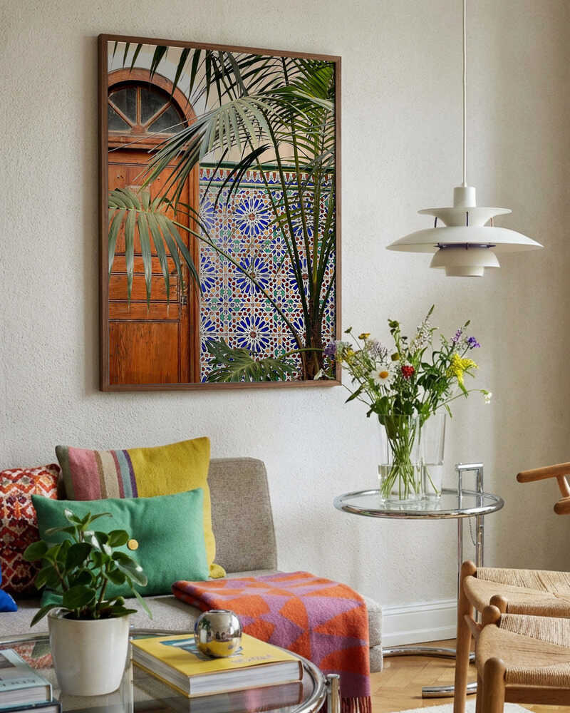 Vibrant Tiles and Palm Door