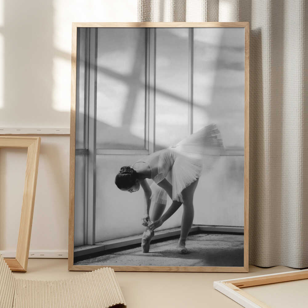 Ballerina Tying Pointe Shoes