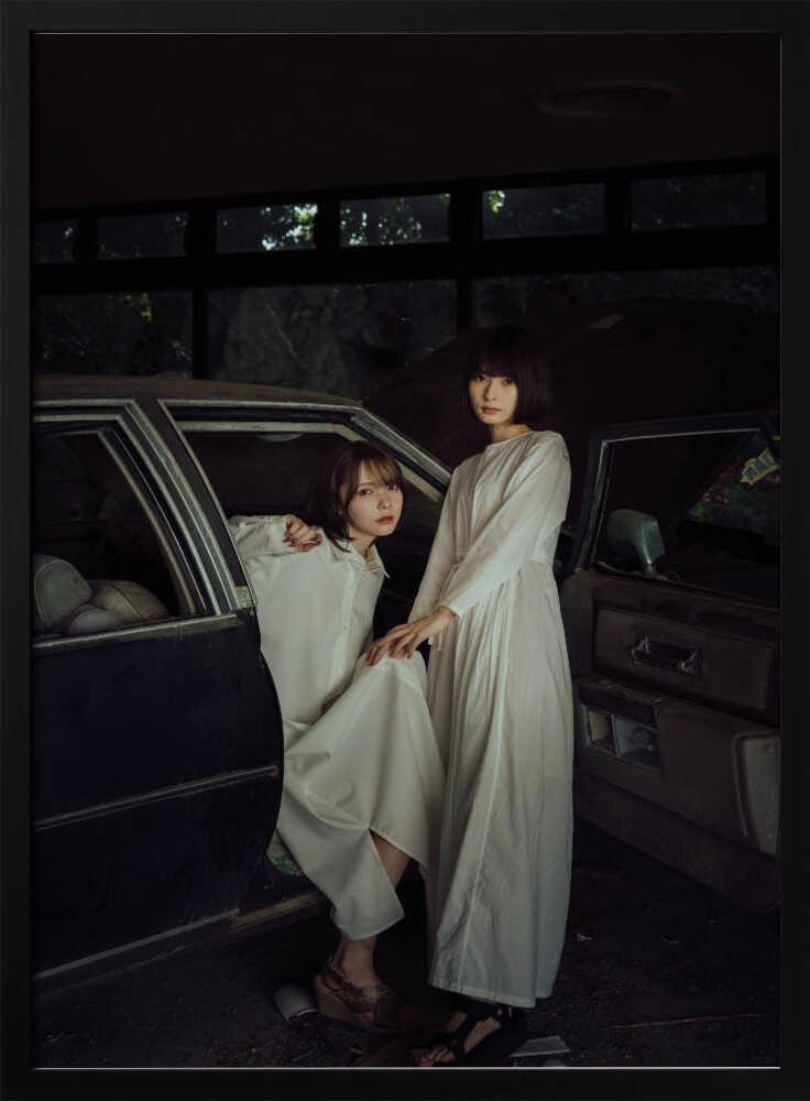 Two Women Vintage Car
