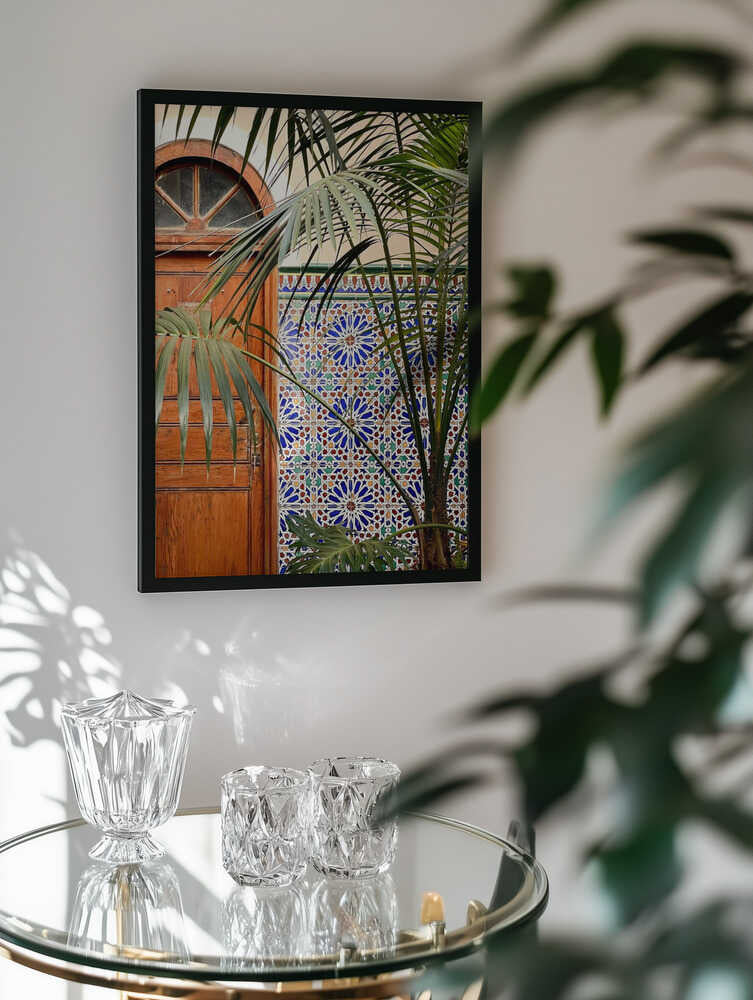 Vibrant Tiles and Palm Door