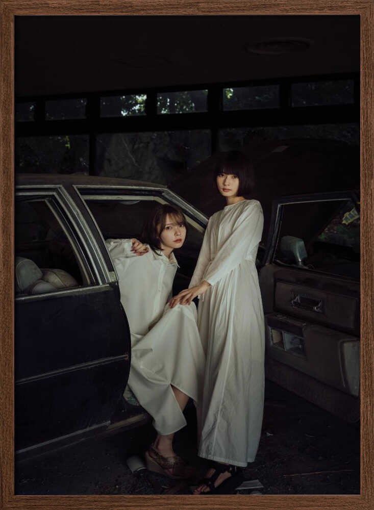 Two Women Vintage Car