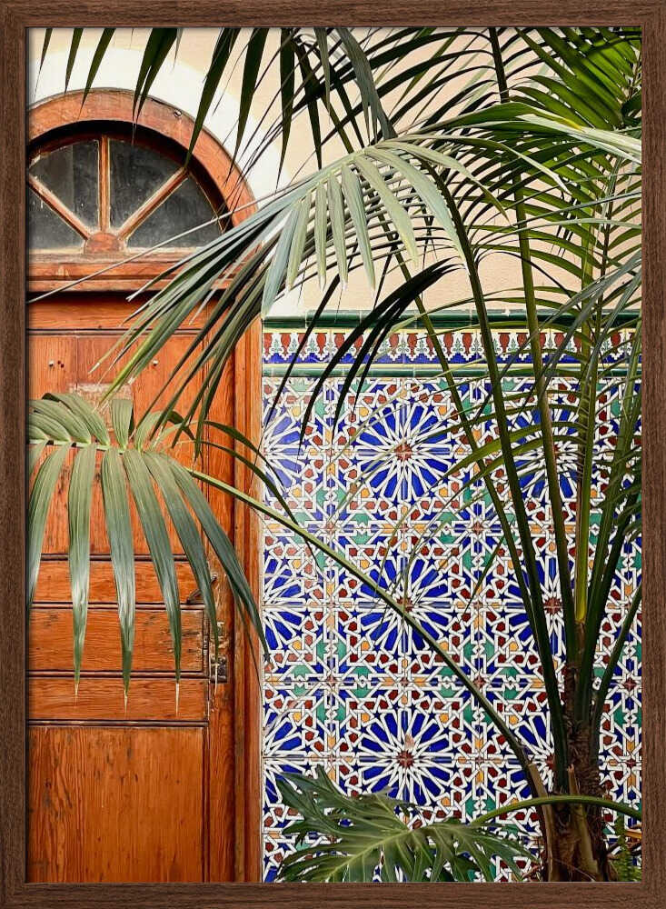 Vibrant Tiles and Palm Door