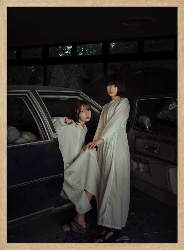 Two Women Vintage Car