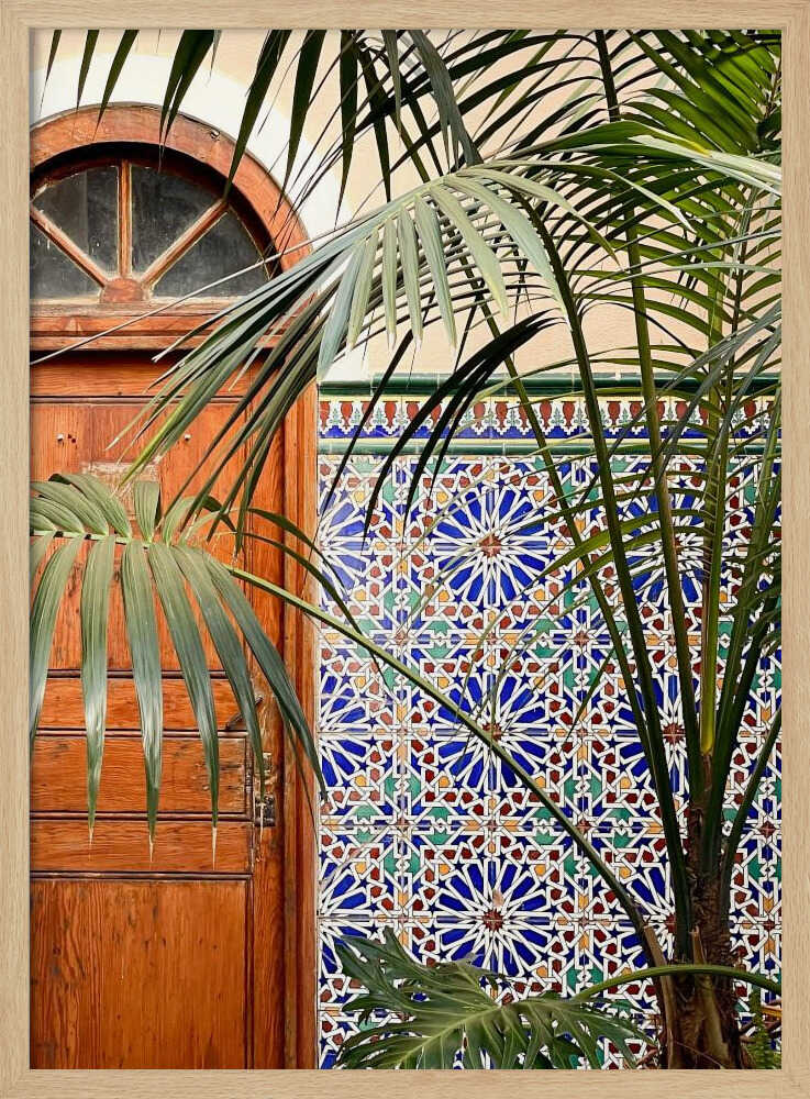 Vibrant Tiles and Palm Door