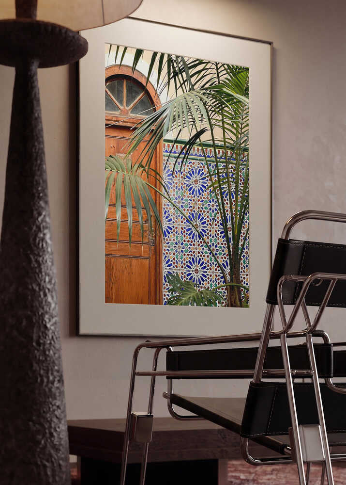 Vibrant Tiles and Palm Door